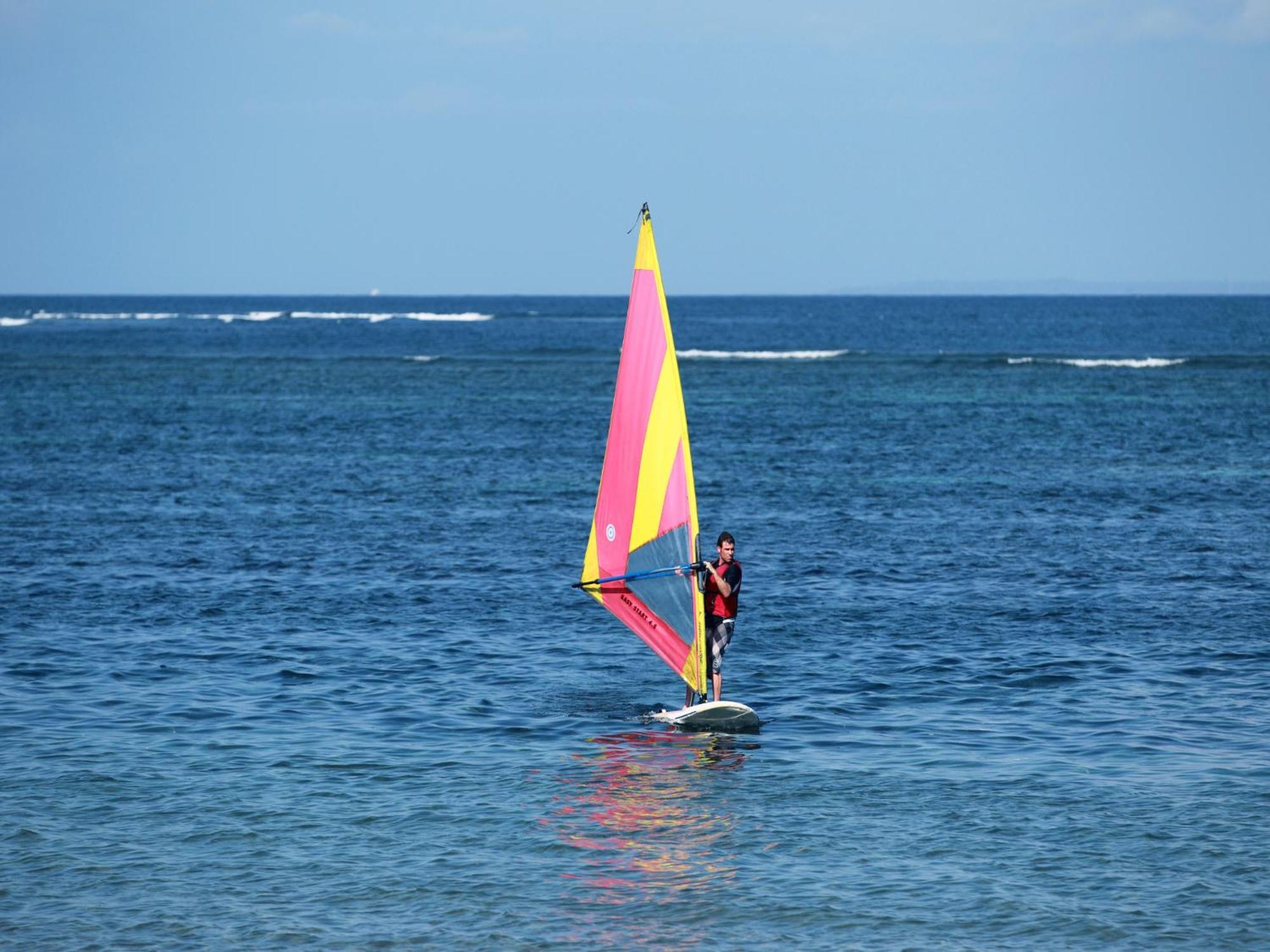 Grand Mirage Resort & Thalasso Bali Nusa Dua  Extérieur photo Windsurfer at the beach